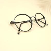 Black round unisex metal eyeglasses ( eq0003 918310 )